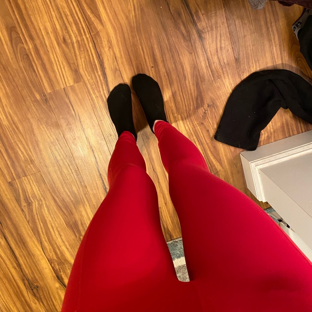 Red fabletics leggings with pockets. size small